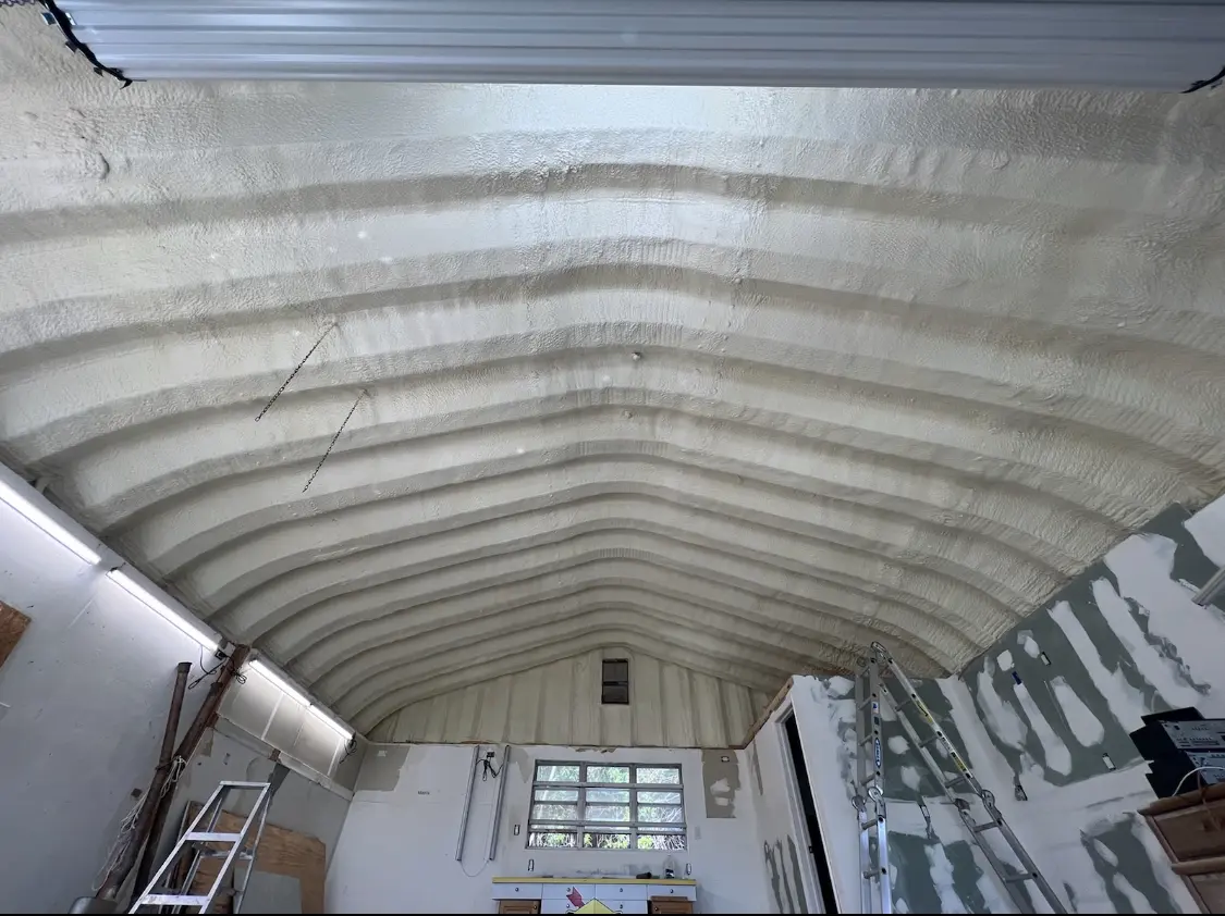 Spray polyurethane foam applied to the underside of a metal roof deck in North Lebanon